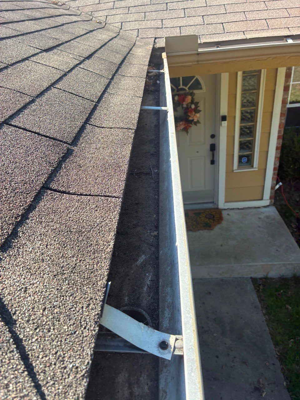Freshly cleaned and sealed seamless gutter run